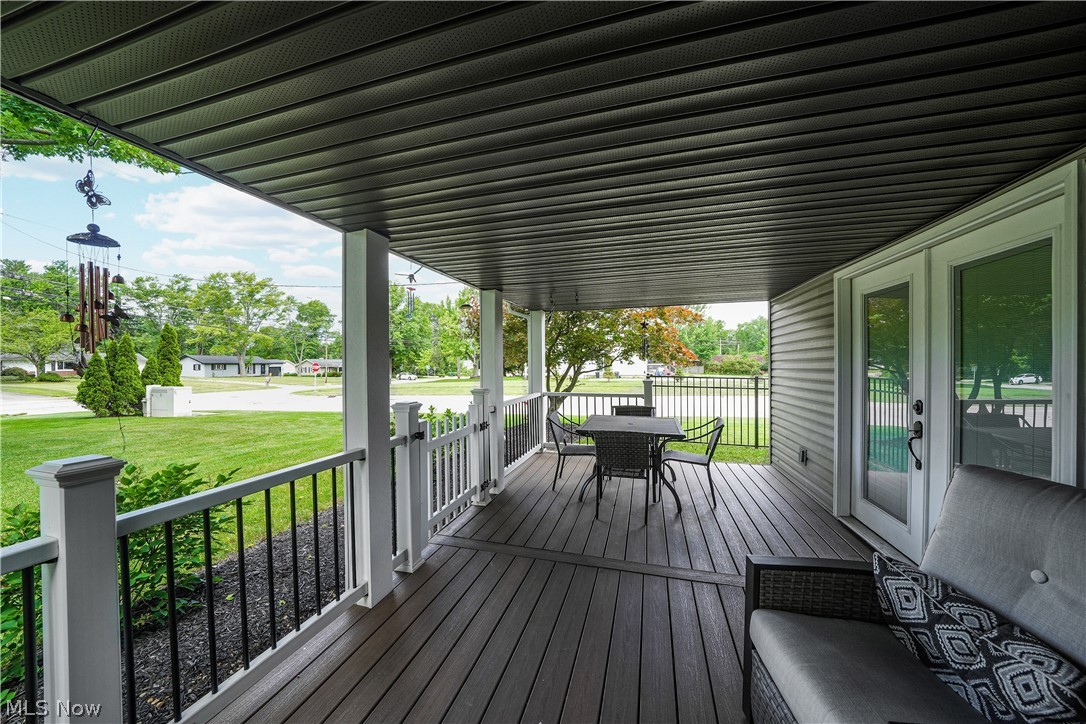 11247 Prospect Road Strongsville, OH 44149 - Photo 11 of 49 Wooden deck featuring a yard and french doors