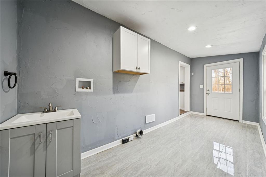 148 Sycamore Street Irwin, PA 15642 - Photo 15 of 45 a view of a bathroom with a sink