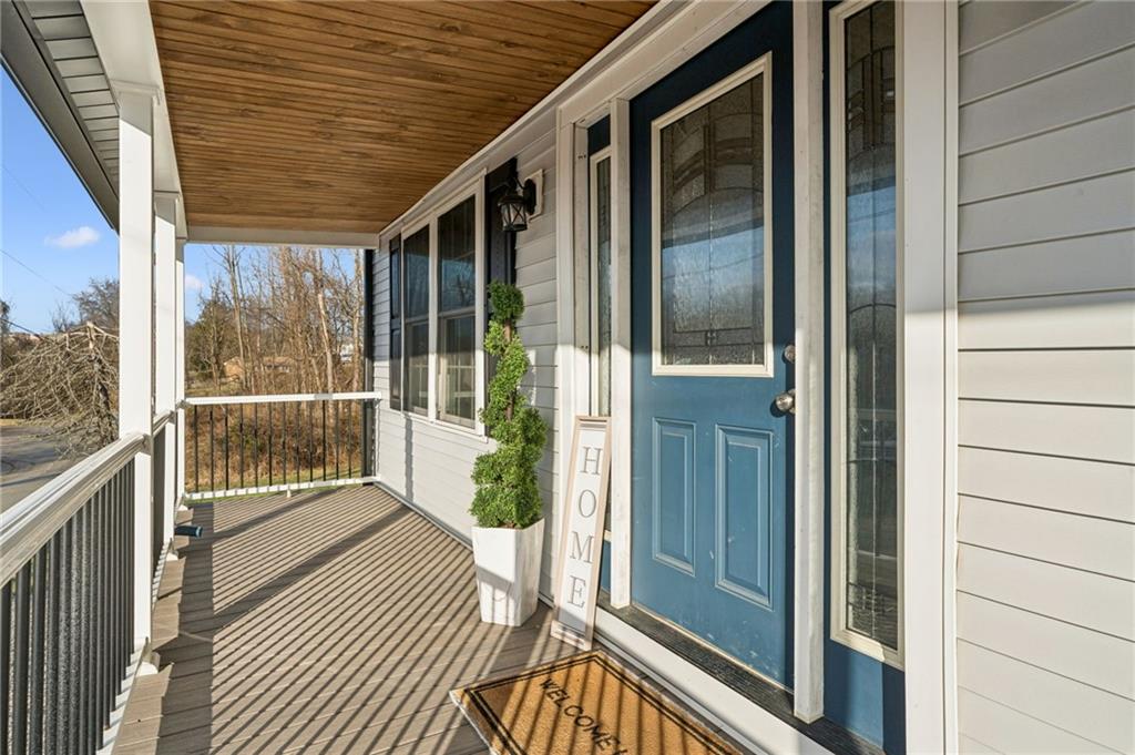 148 Sycamore Street Irwin, PA 15642 - Photo 2 of 45 a view of a balcony with wooden floor