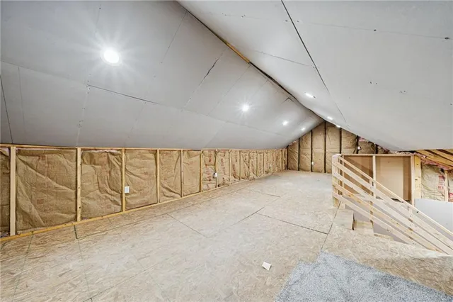 a view of balcony with wooden floor and fence
