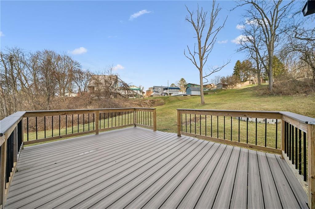 148 Sycamore Street Irwin, PA 15642 - Photo 31 of 45 a view of balcony with wooden floor and fence
