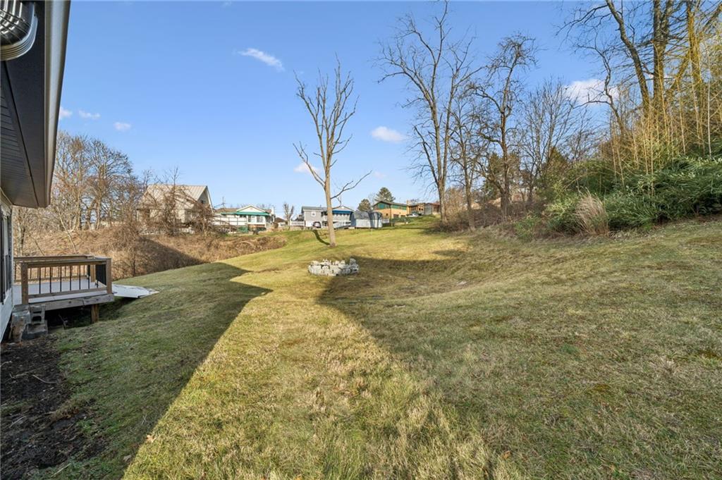148 Sycamore Street Irwin, PA 15642 - Photo 33 of 45 a view of a yard with an ocean view