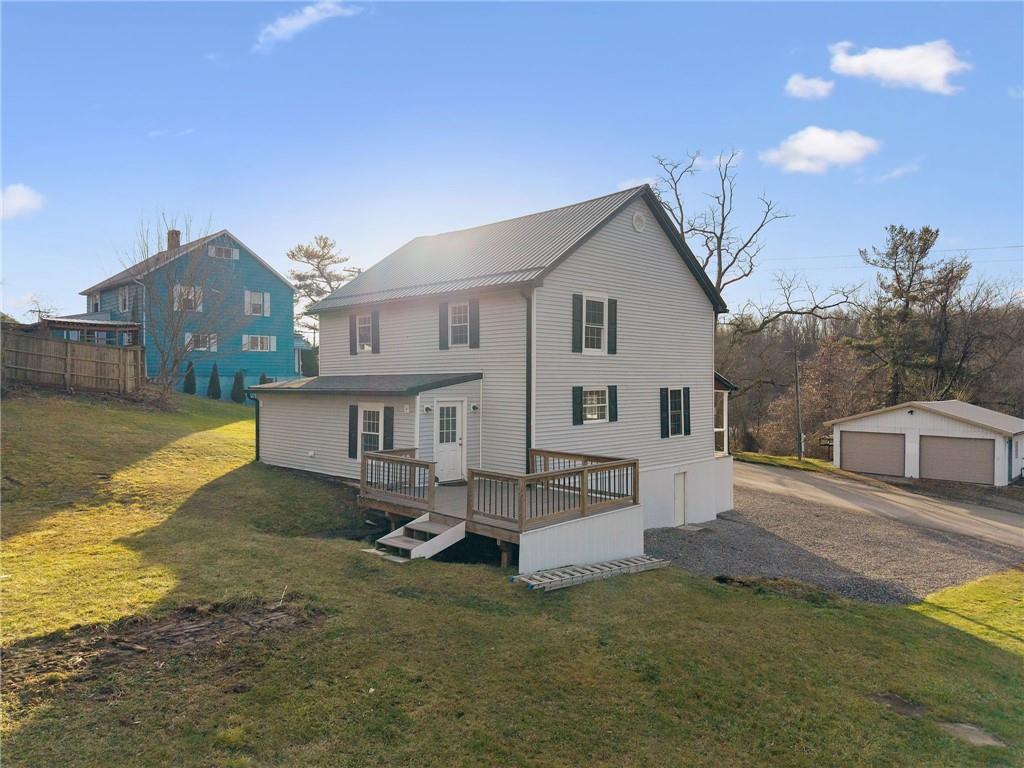 148 Sycamore Street Irwin, PA 15642 - Photo 35 of 45 a view of a house with a yard