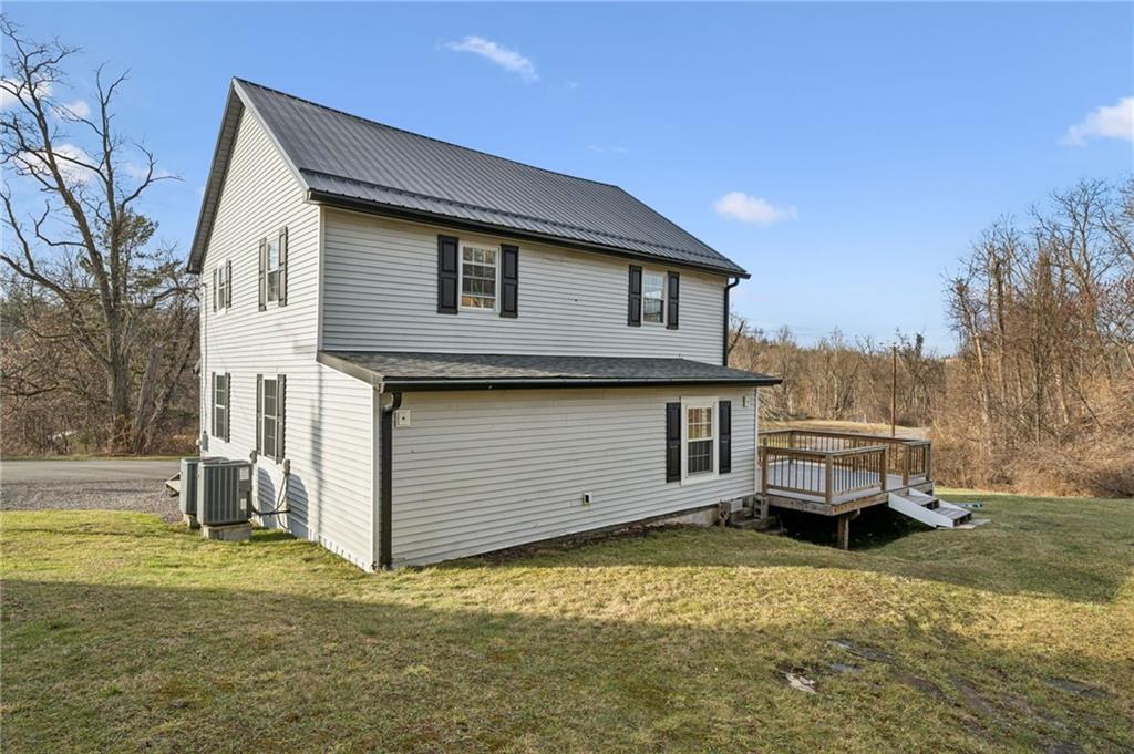 148 Sycamore Street Irwin, PA 15642 - Photo 36 of 45 a front view of a house with a yard