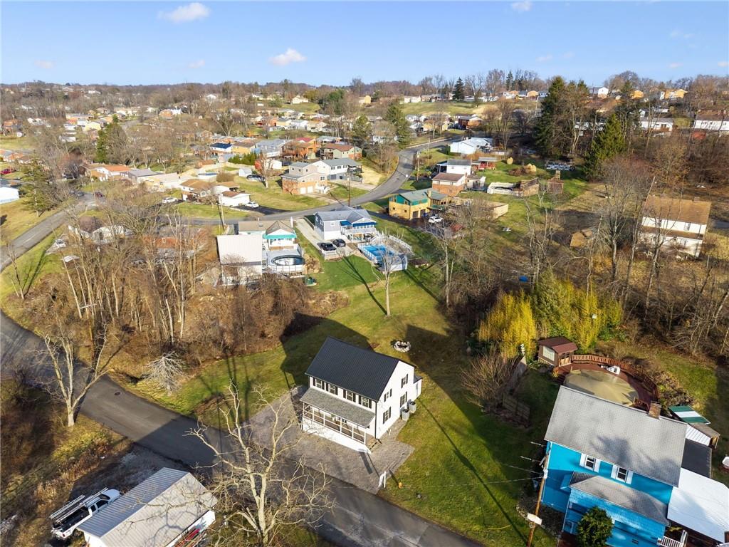 148 Sycamore Street Irwin, PA 15642 - Photo 39 of 45 an aerial view of residential building with parking