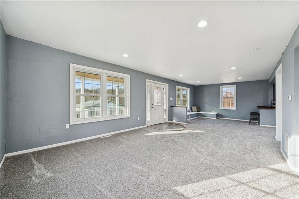 148 Sycamore Street Irwin, PA 15642 - Photo 7 of 45 a big room with windows and closet