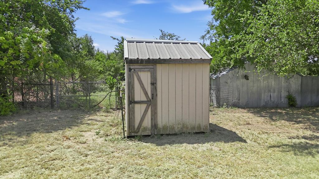 892 Highland Circle Springtown, TX 76082 - Photo 36 of 40 Great for storage.