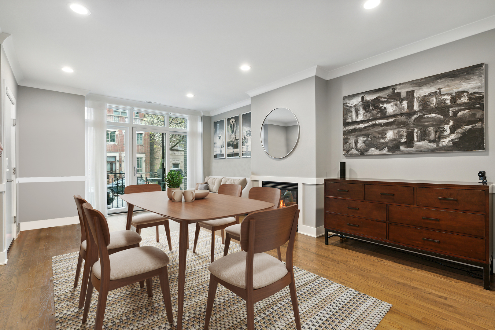 1044 West Polk Street, Unit 1 Chicago, IL 60607 - Photo 3 of 22 a view of a dining room with furniture window and wooden floor