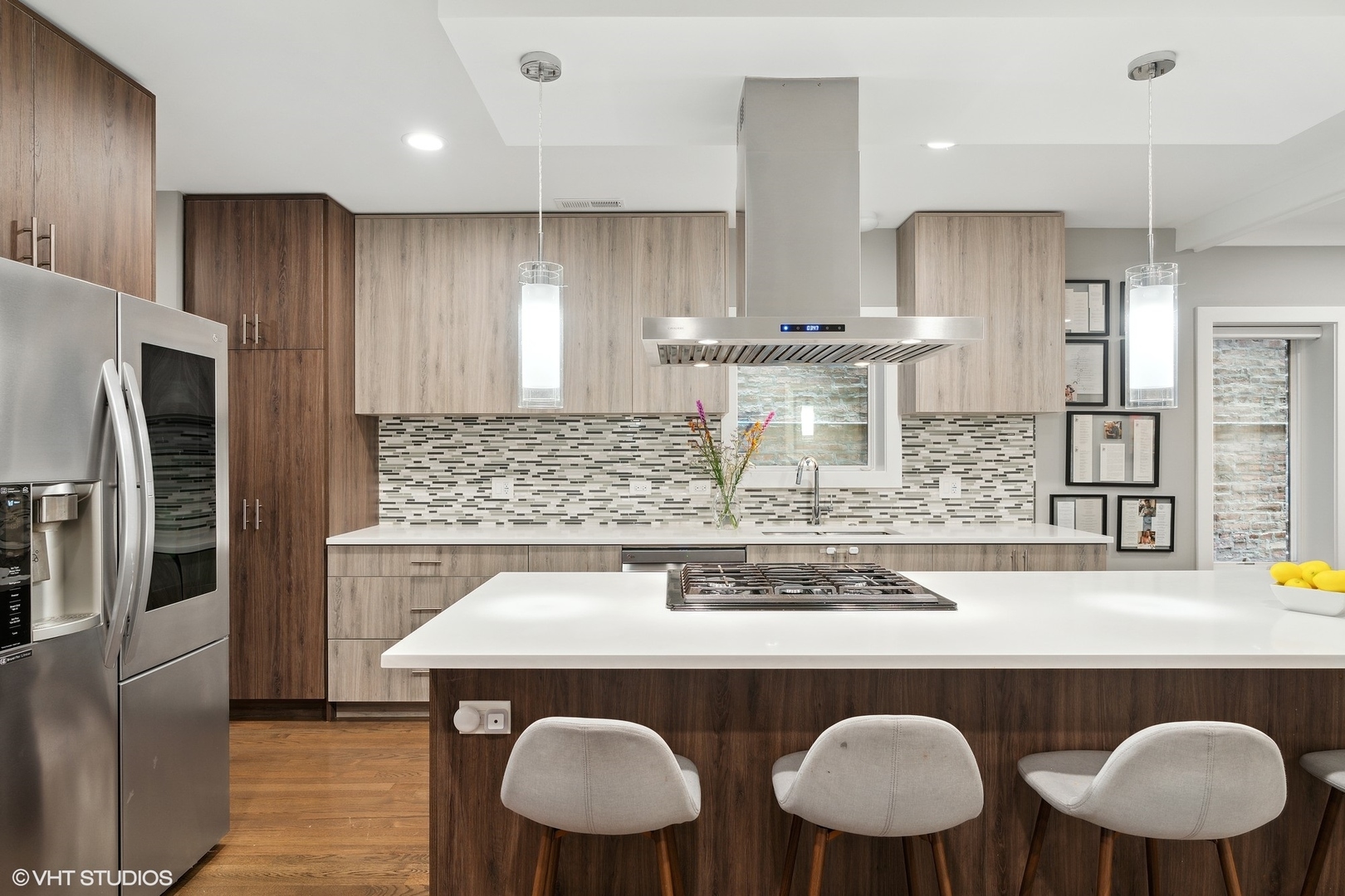 1044 West Polk Street, Unit 1 Chicago, IL 60607 - Photo 6 of 22 a kitchen with a table and chairs in it