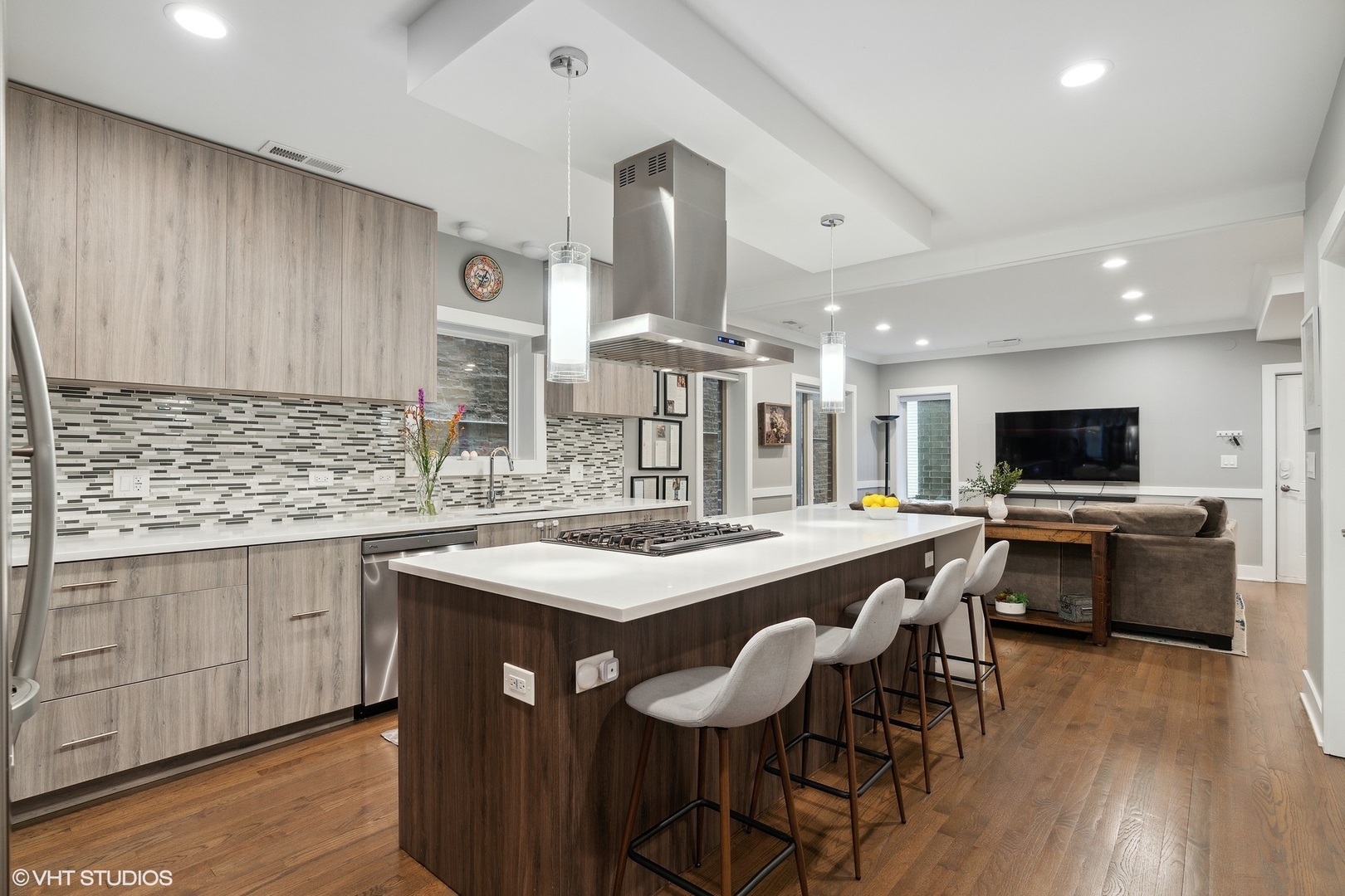 1044 West Polk Street, Unit 1 Chicago, IL 60607 - Photo 7 of 22 a kitchen with stainless steel appliances a sink and stove