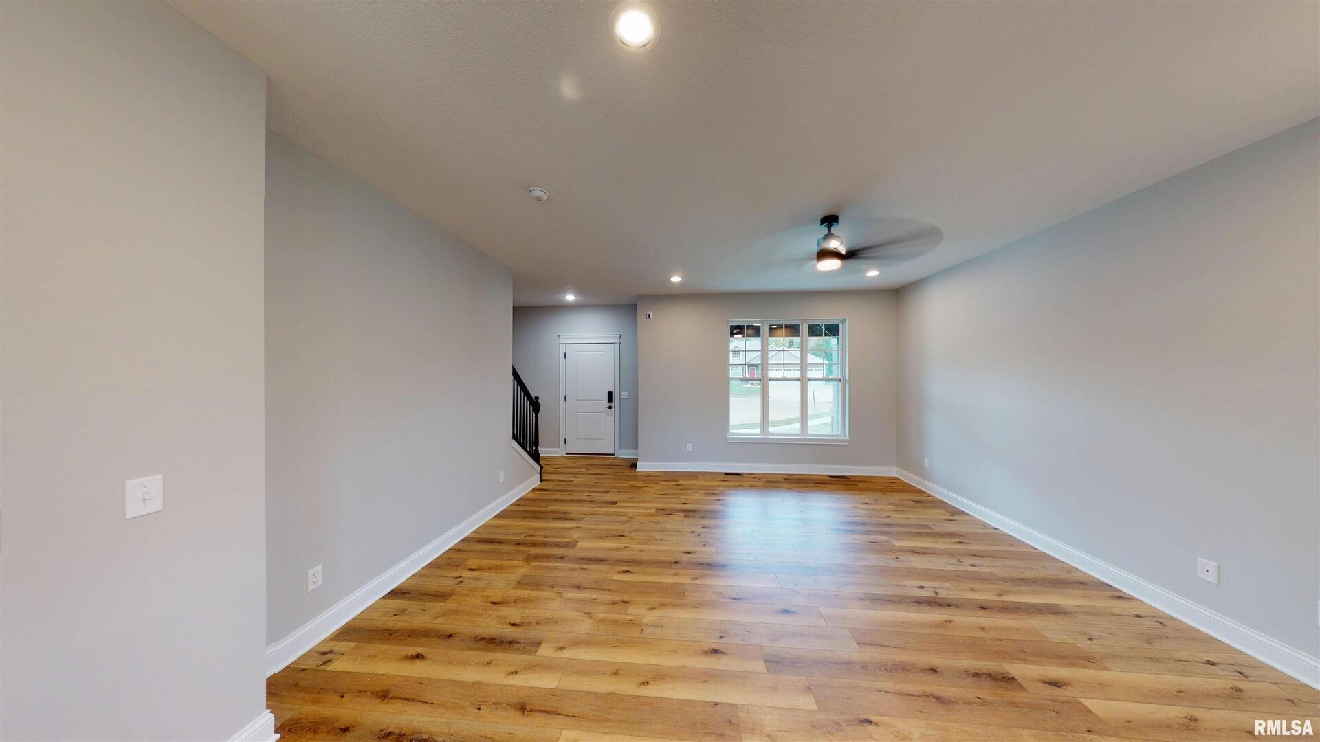 11 Faiths Way Bettendorf, IA 52722 - Photo 18 of 22 a view of an empty room and window