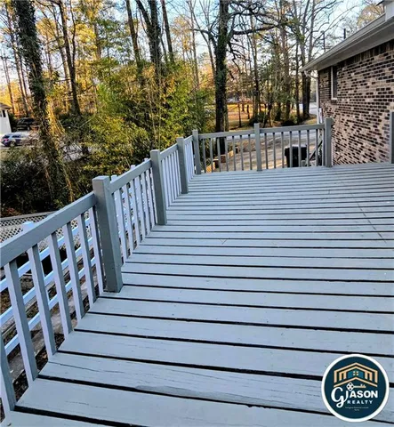 a view of a deck with a trees