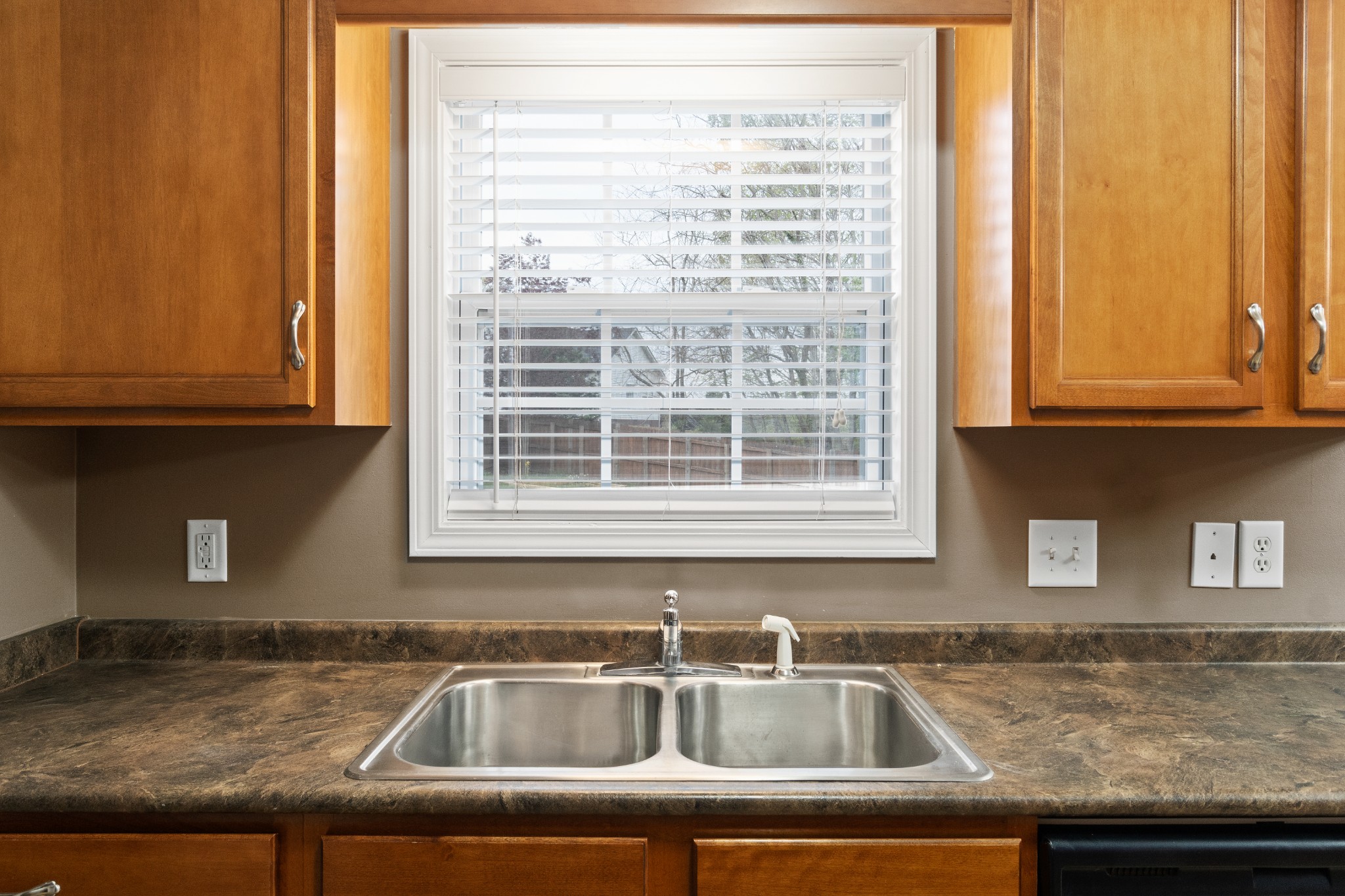 3178 Cross Ridge Drive Clarksville, TN 37040 - Photo 11 of 25 a kitchen with granite countertop sink and cabinets