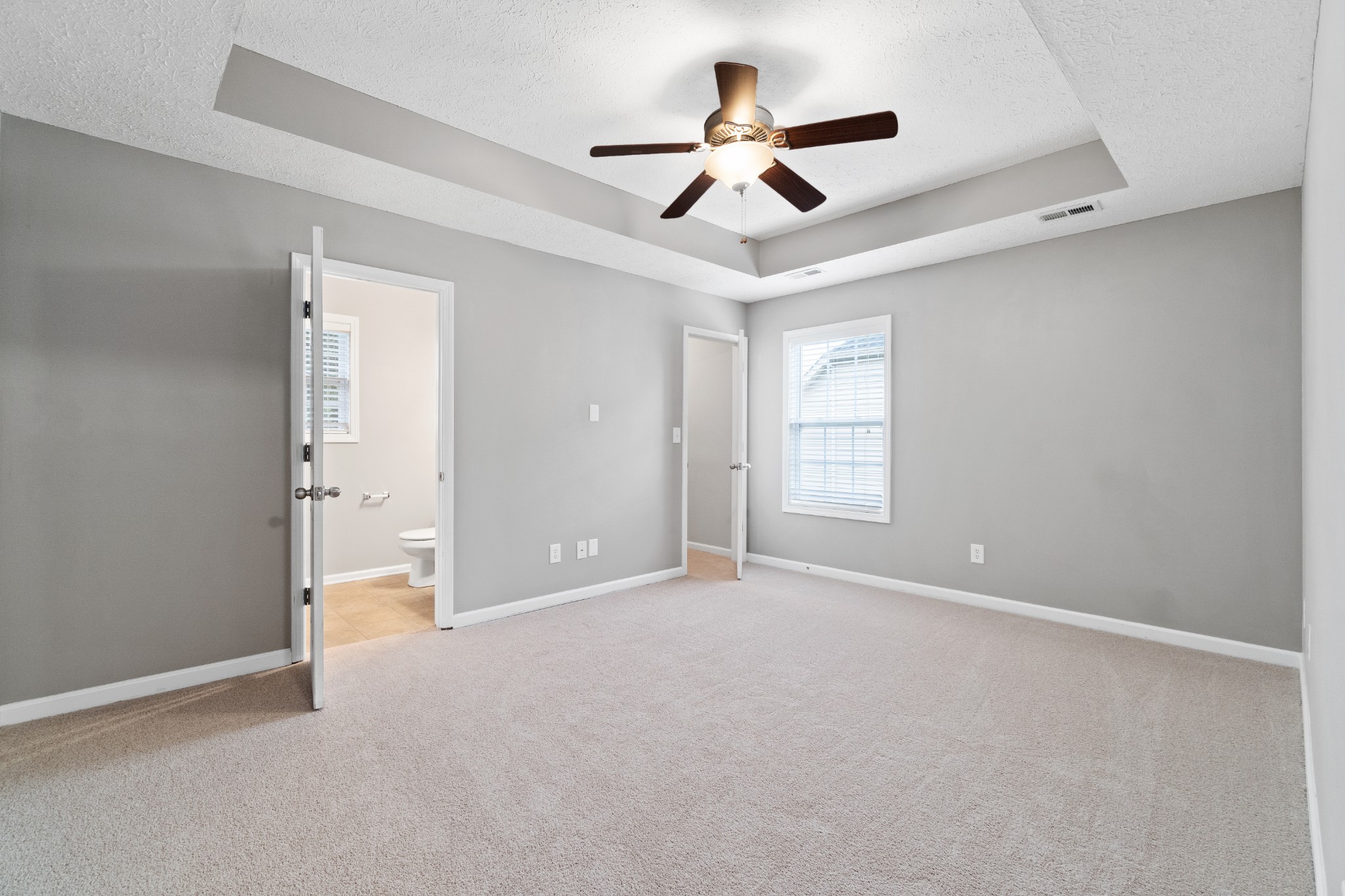 3178 Cross Ridge Drive Clarksville, TN 37040 - Photo 13 of 25 an empty room with ceiling fan and windows