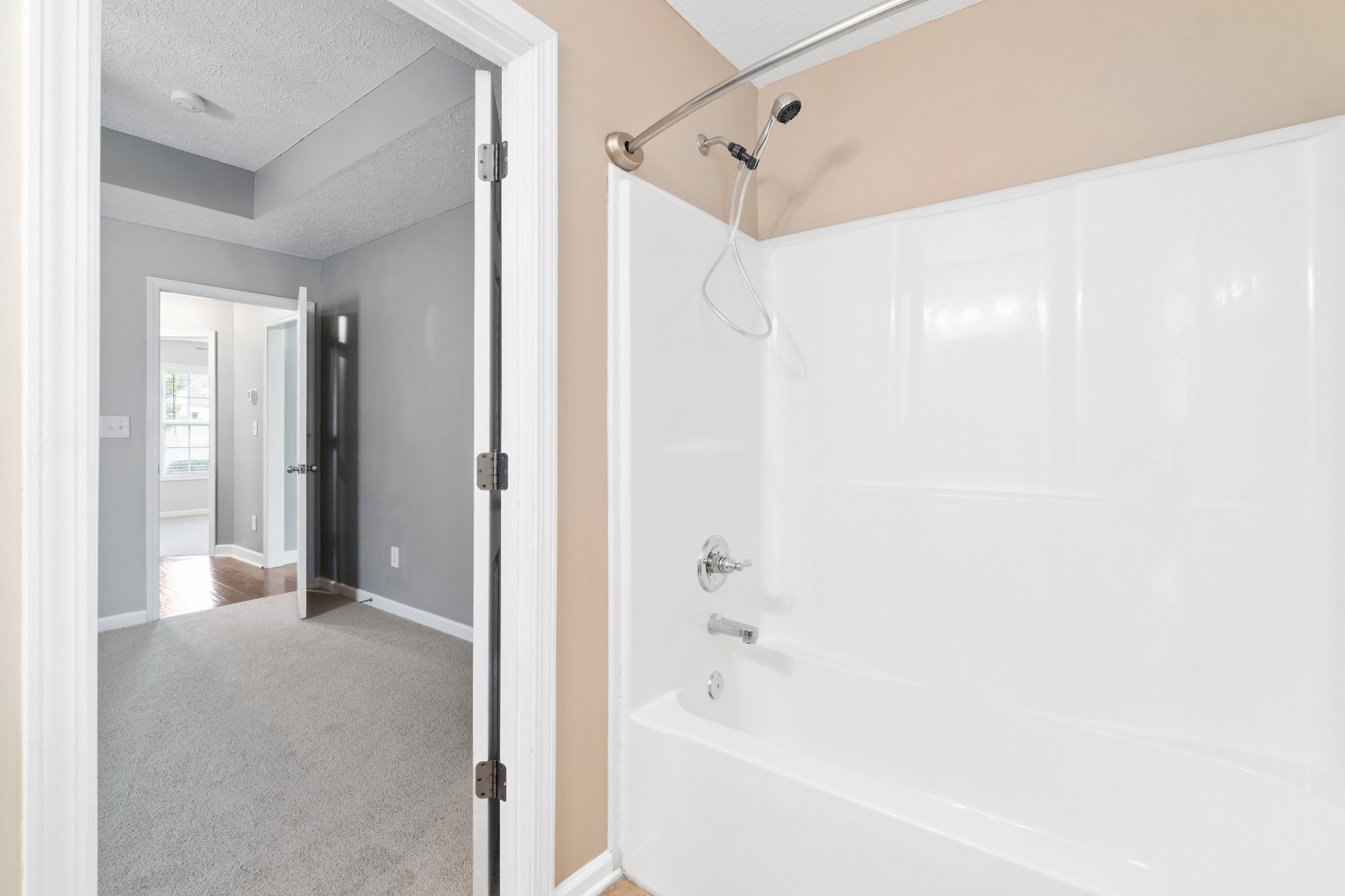 3178 Cross Ridge Drive Clarksville, TN 37040 - Photo 16 of 25 a bathroom with a bathtub and a shower
