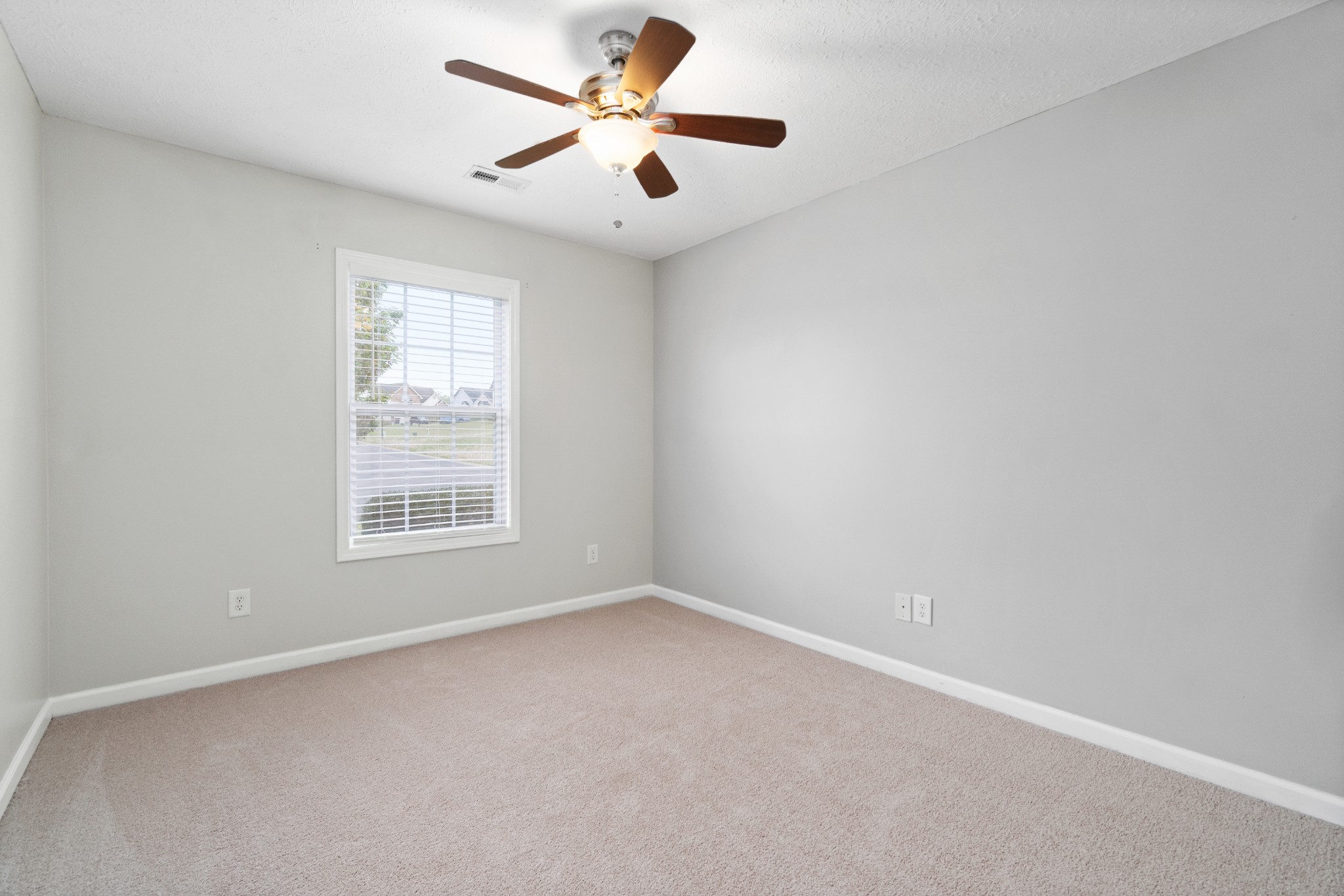 3178 Cross Ridge Drive Clarksville, TN 37040 - Photo 17 of 25 an empty room with a window and a fan