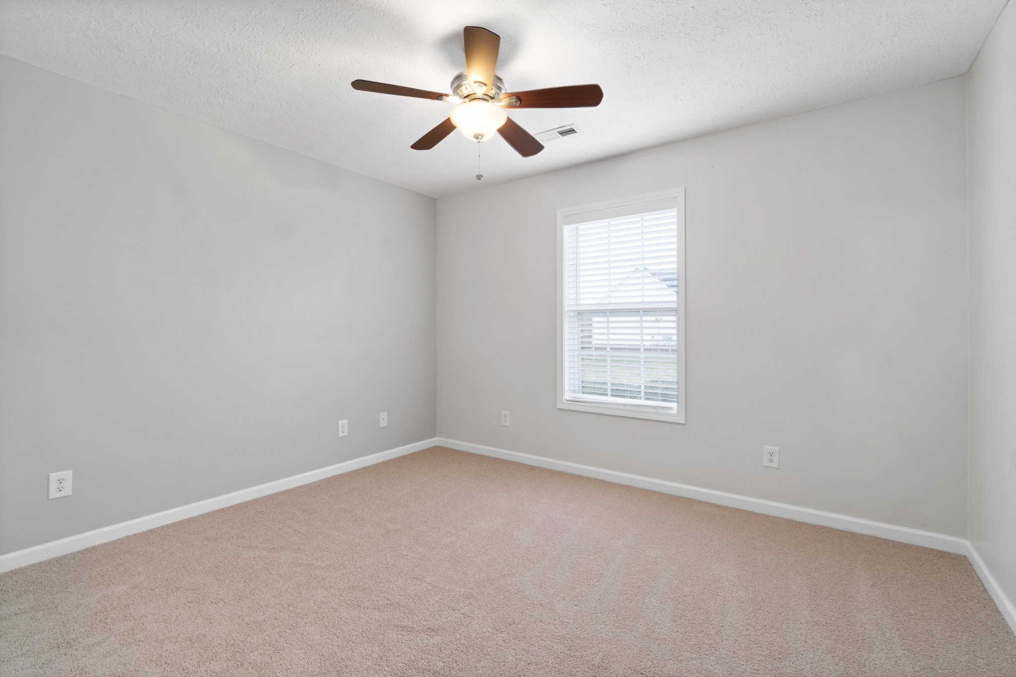 3178 Cross Ridge Drive Clarksville, TN 37040 - Photo 18 of 25 an empty room with a window and a fan