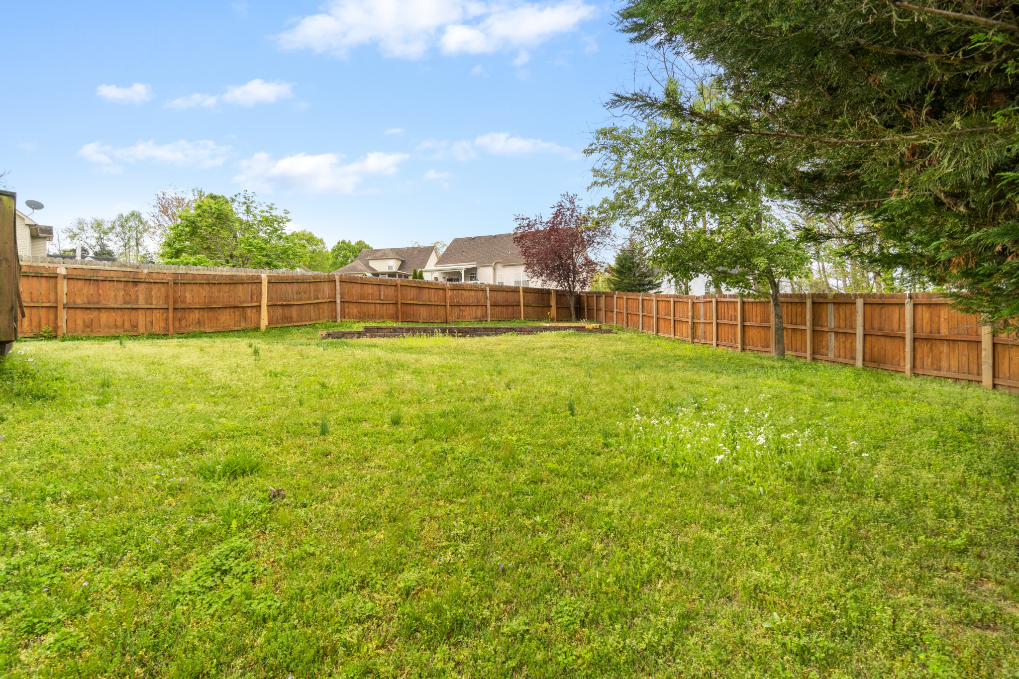 3178 Cross Ridge Drive Clarksville, TN 37040 - Photo 23 of 25 a backyard of a house with lots of green space