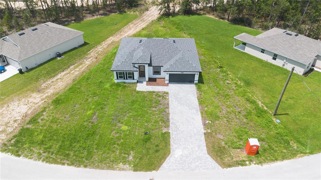 13265 Southwest 85th Circle Ocala, FL 34473 - Photo 4 of 53 an aerial view of a house