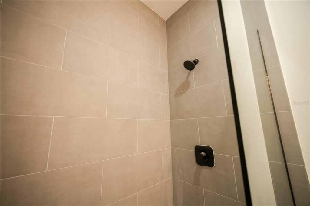 13265 Southwest 85th Circle Ocala, FL 34473 - Photo 43 of 53 a bathroom with a shower