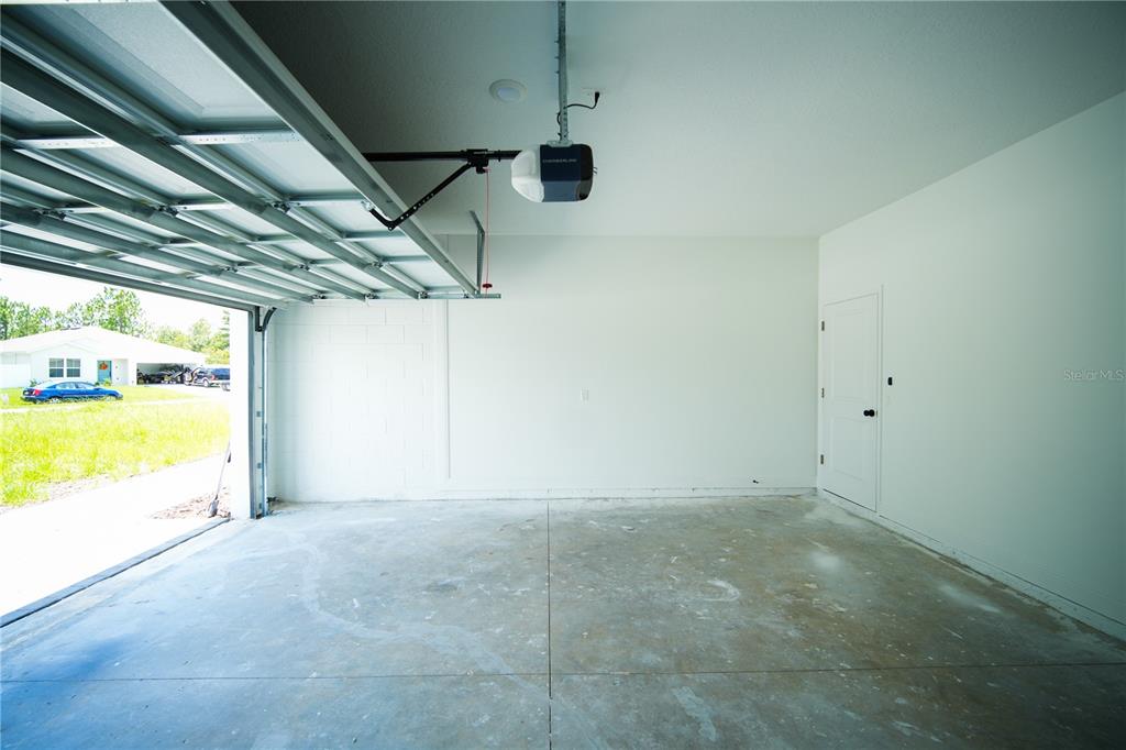 13265 Southwest 85th Circle Ocala, FL 34473 - Photo 52 of 53 a view of a room with racks on the wall
