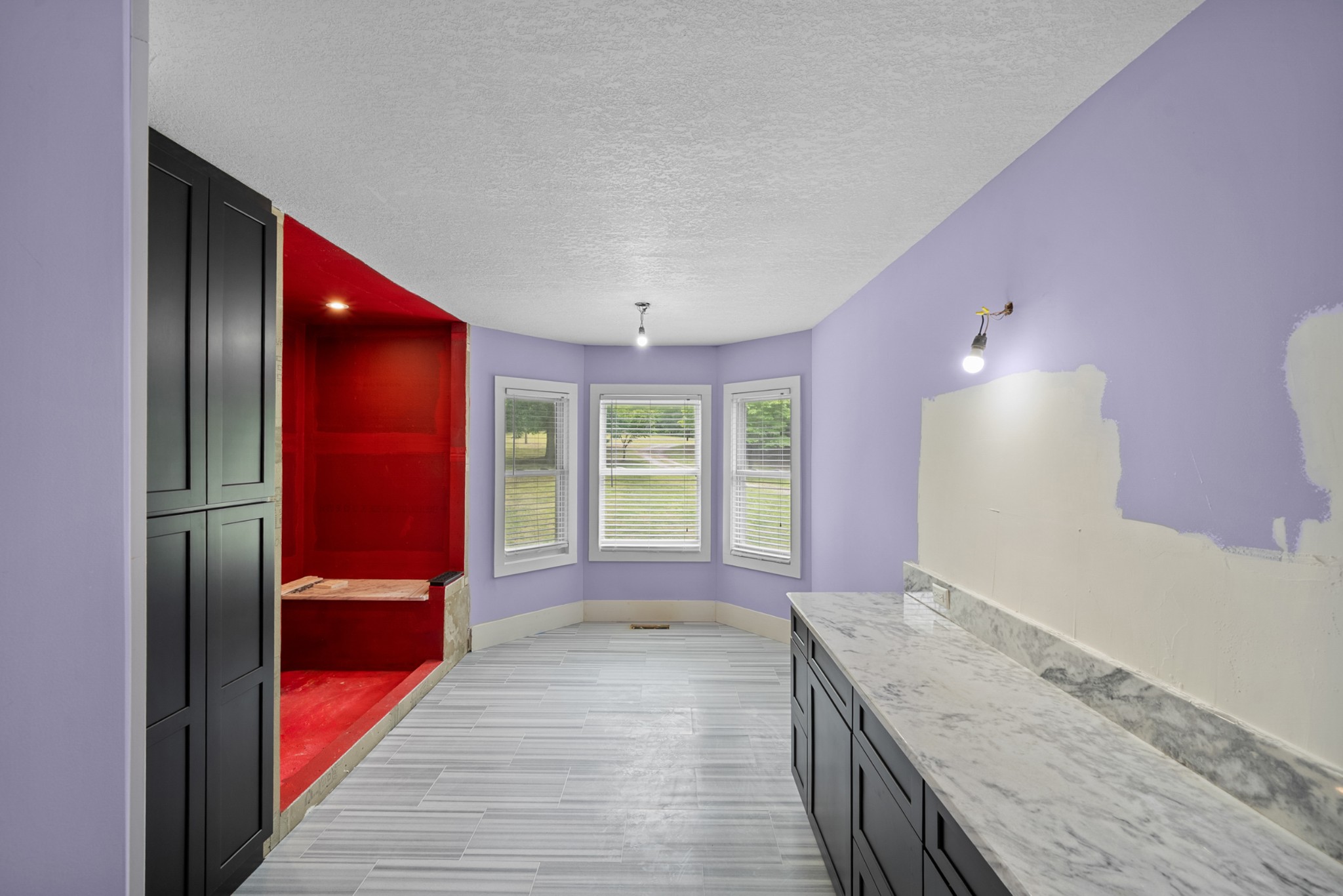 3287 Keith Springs Mountain Road Belvidere, TN 37306 - Photo 16 of 57 a spacious bathroom with a granite countertop tub and a large mirror