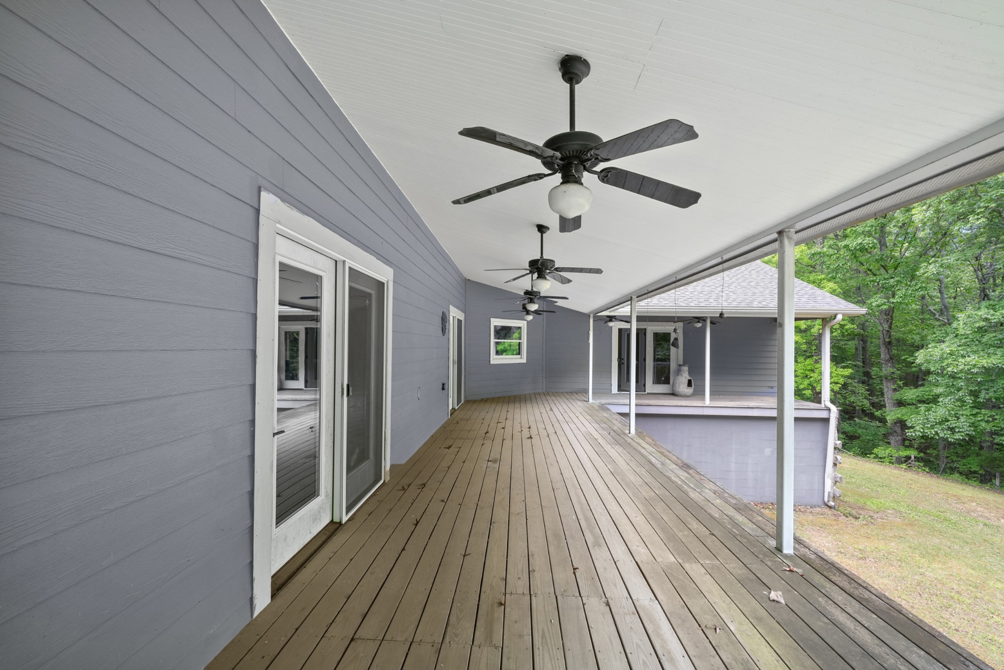 3287 Keith Springs Mountain Road Belvidere, TN 37306 - Photo 43 of 57 a view of a porch with wooden floor and front door