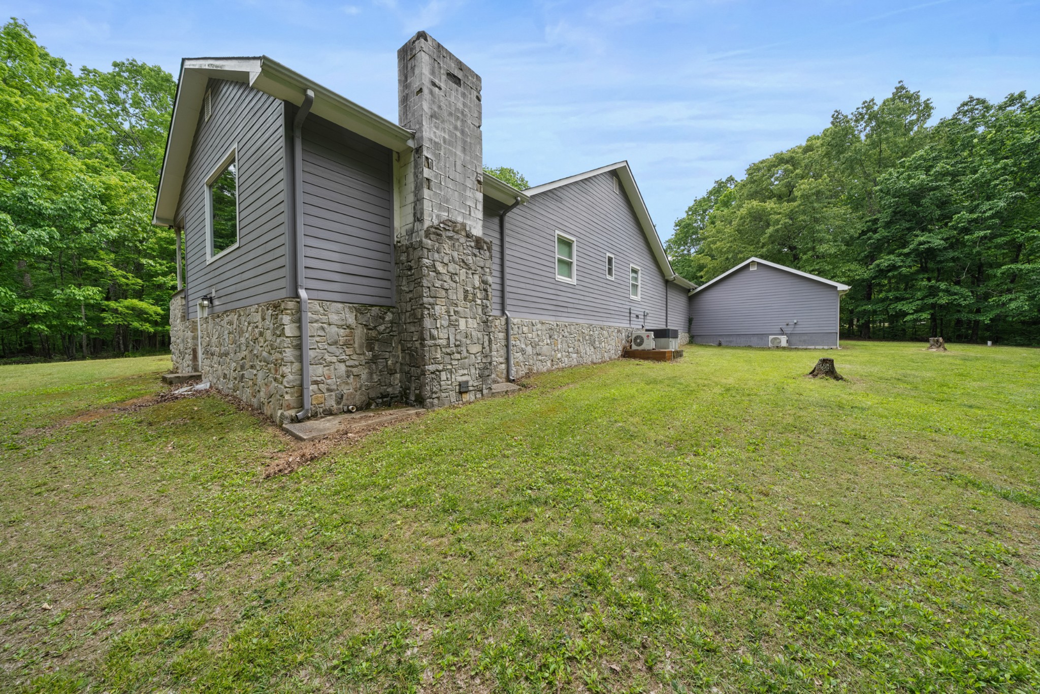 3287 Keith Springs Mountain Road Belvidere, TN 37306 - Photo 48 of 57 a front view of a house with a yard and garage