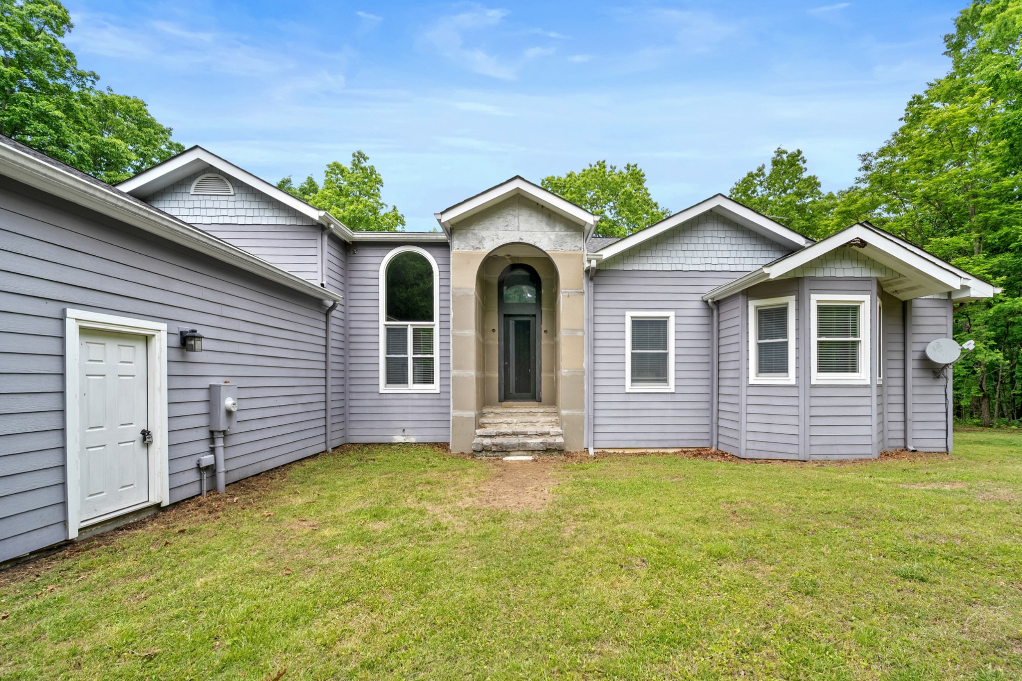 3287 Keith Springs Mountain Road Belvidere, TN 37306 - Photo 7 of 57 a front view of a house with a garden and yard