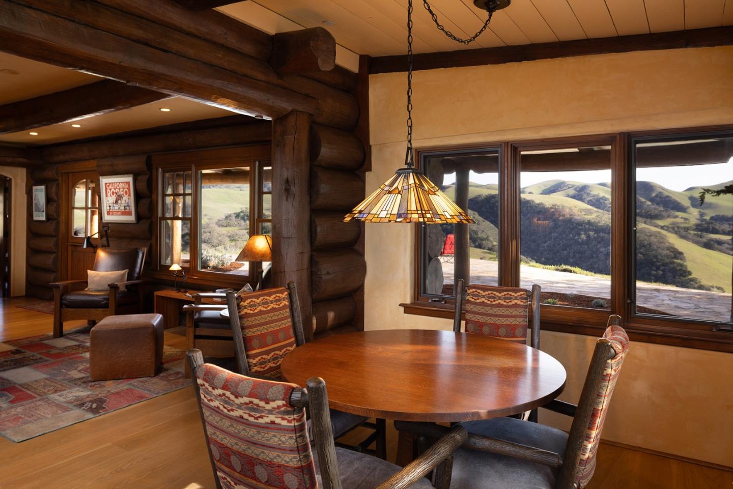 28000 Underwood Road Salinas, CA 93908 - Photo 17 of 41 a dining room with furniture a chandelier and wooden floor