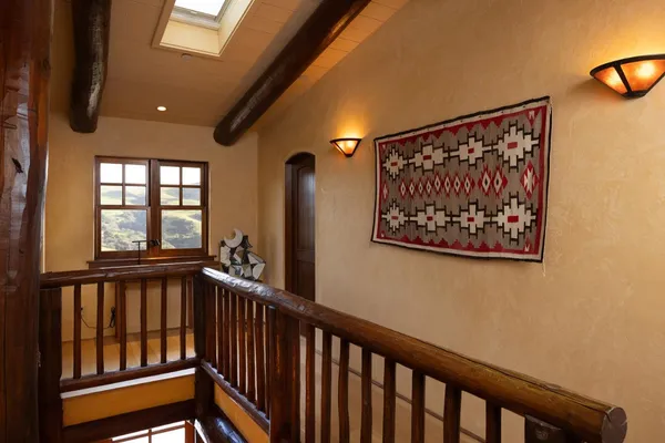 a view of a hallway with windows