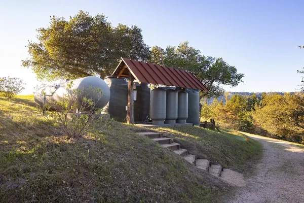 a backyard of a house with lots of green space