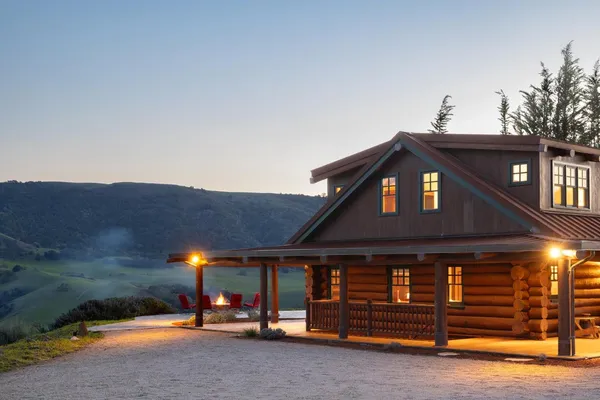 a front view of a house with parking