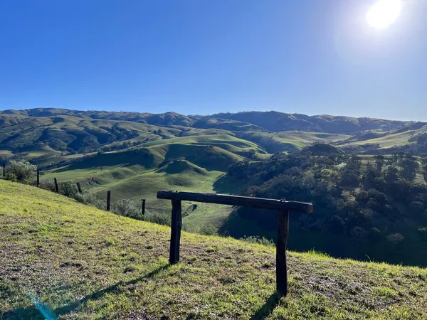 a view of a lake with a mountain in the background