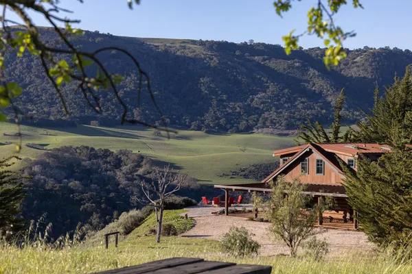 a front view of house with a yard