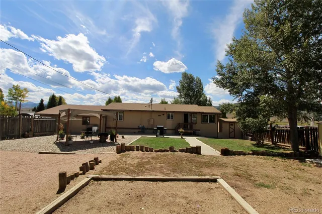 a view of a house with snow in the yard