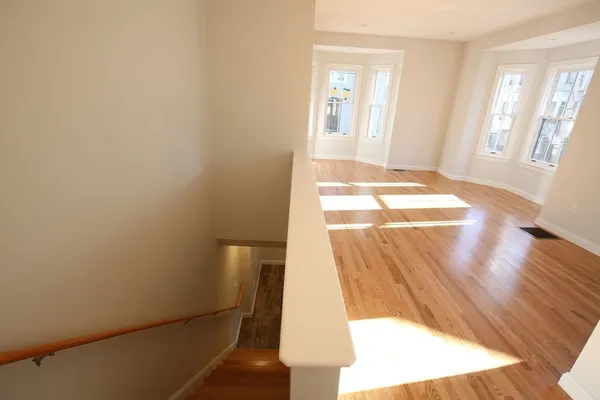 a view of an empty room and window