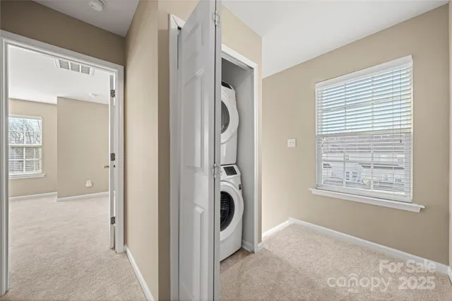 a view of a storage & utility room with washer and dryer