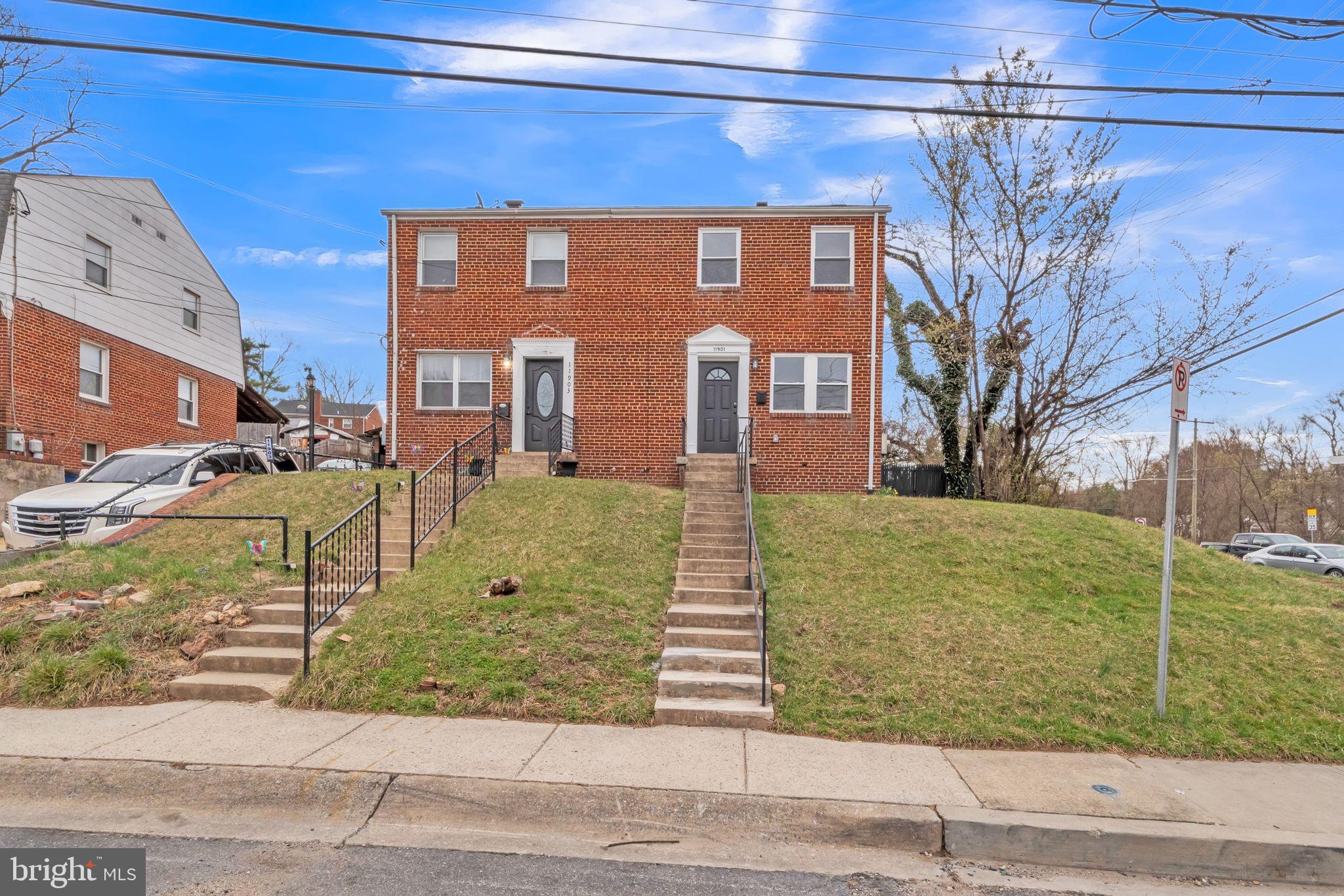 11901 Dalewood Drive Silver Spring, MD 20902 - Photo 2 of 17 a front view of a building with garden