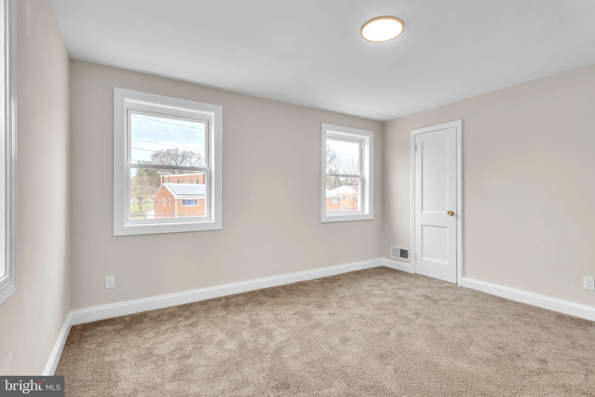 11901 Dalewood Drive Silver Spring, MD 20902 - Photo 10 of 17 an empty room with windows and closet