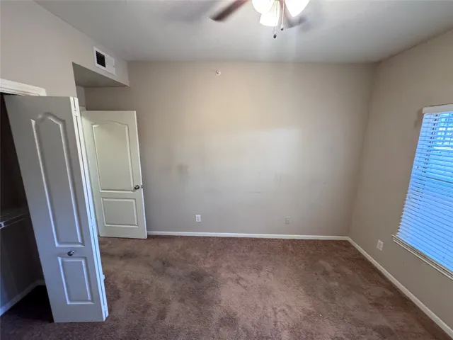 an empty room with a door