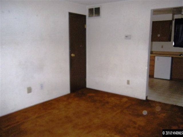 1400 East 9th Street, Unit 2 Reno, NV 89512 - Photo 6 of 7 an empty room with a bathroom