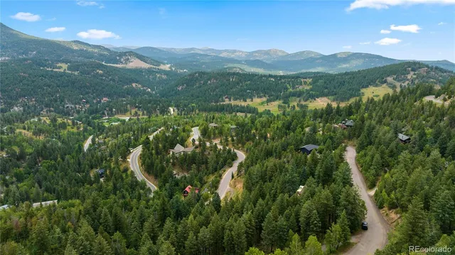 a view of lake with mountain