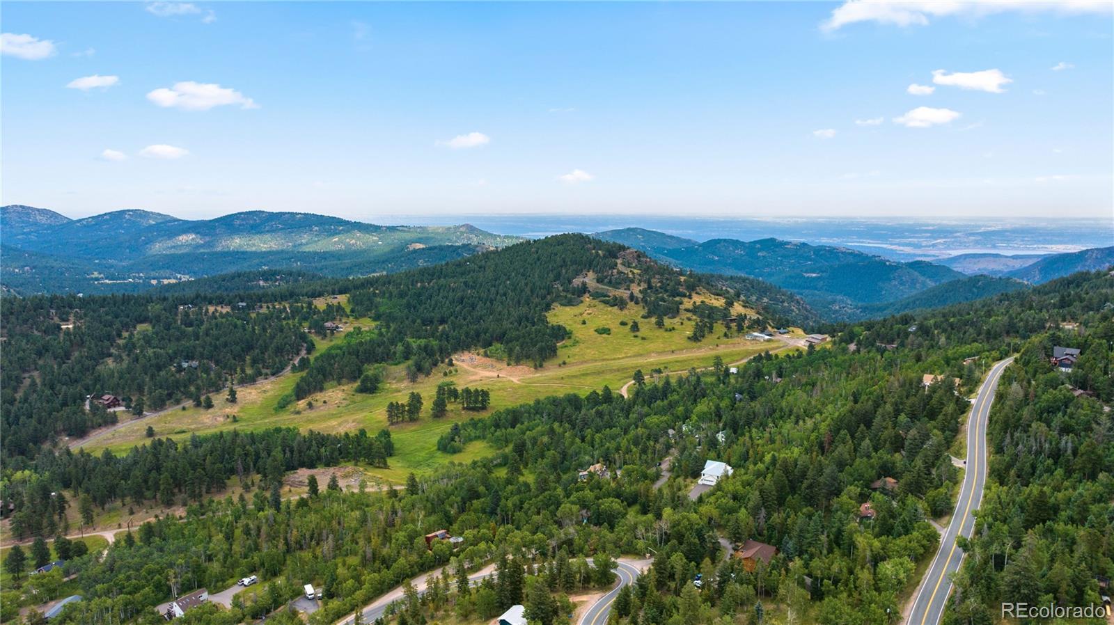 10126 Crest View Drive Morrison, CO 80465 - Photo 6 of 14 a view of lake with mountain