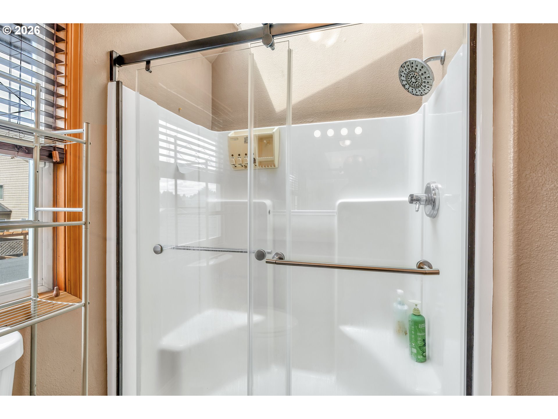 21498 Southwest Jay Street Beaverton, OR 97003 - Photo 36 of 47 a bathroom with a glass shower door and a shower