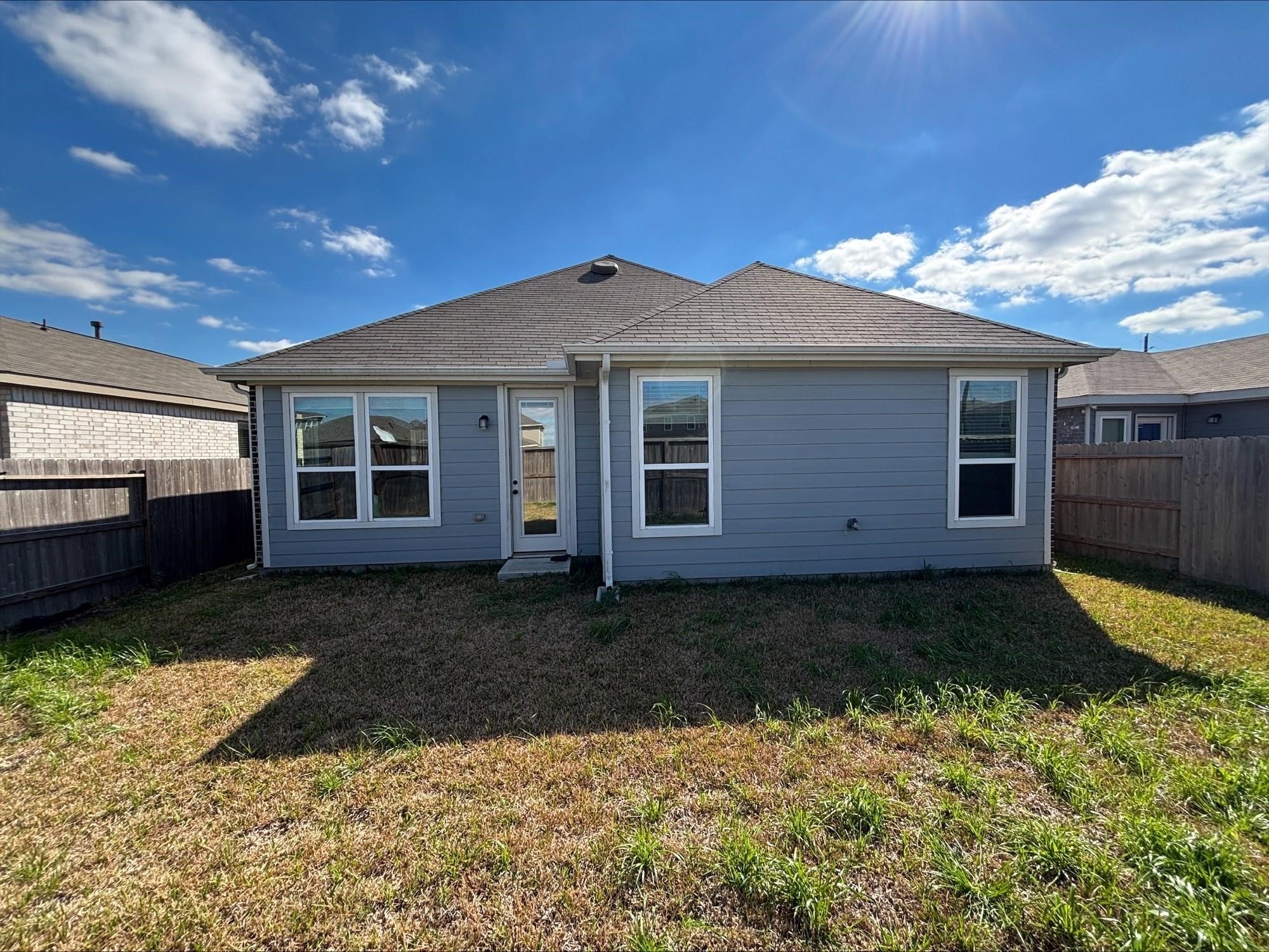 1323 Rosemead Drive Rosharon, TX 77583 - Photo 26 of 27 a view of a house with a yard
