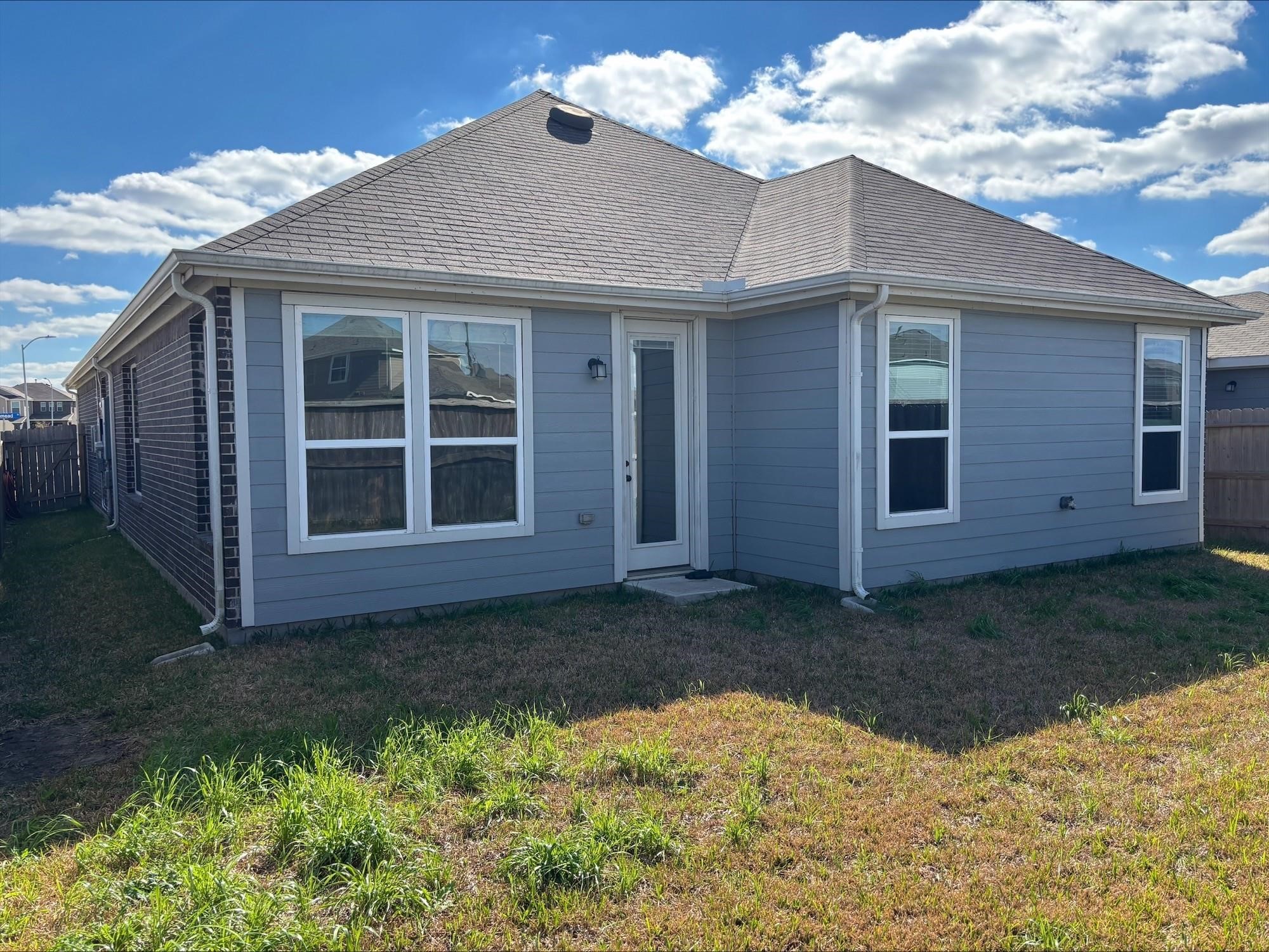 1323 Rosemead Drive Rosharon, TX 77583 - Photo 27 of 27 a view of a house with a yard