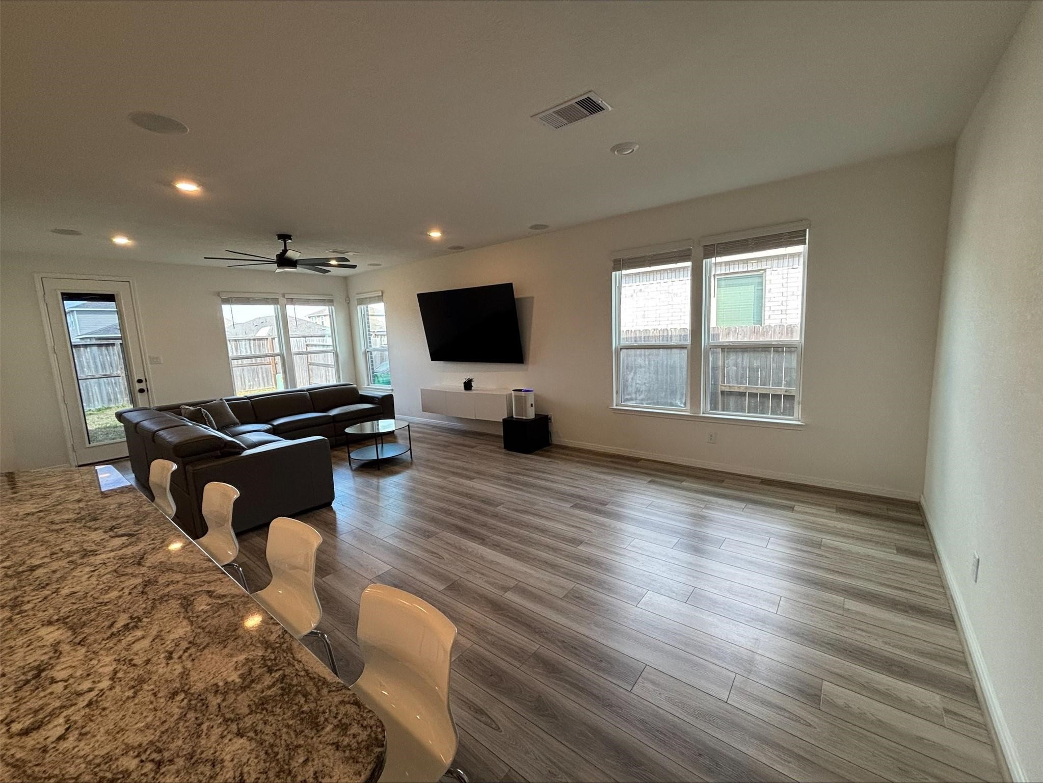 1323 Rosemead Drive Rosharon, TX 77583 - Photo 4 of 27 a living room with furniture and a flat screen tv