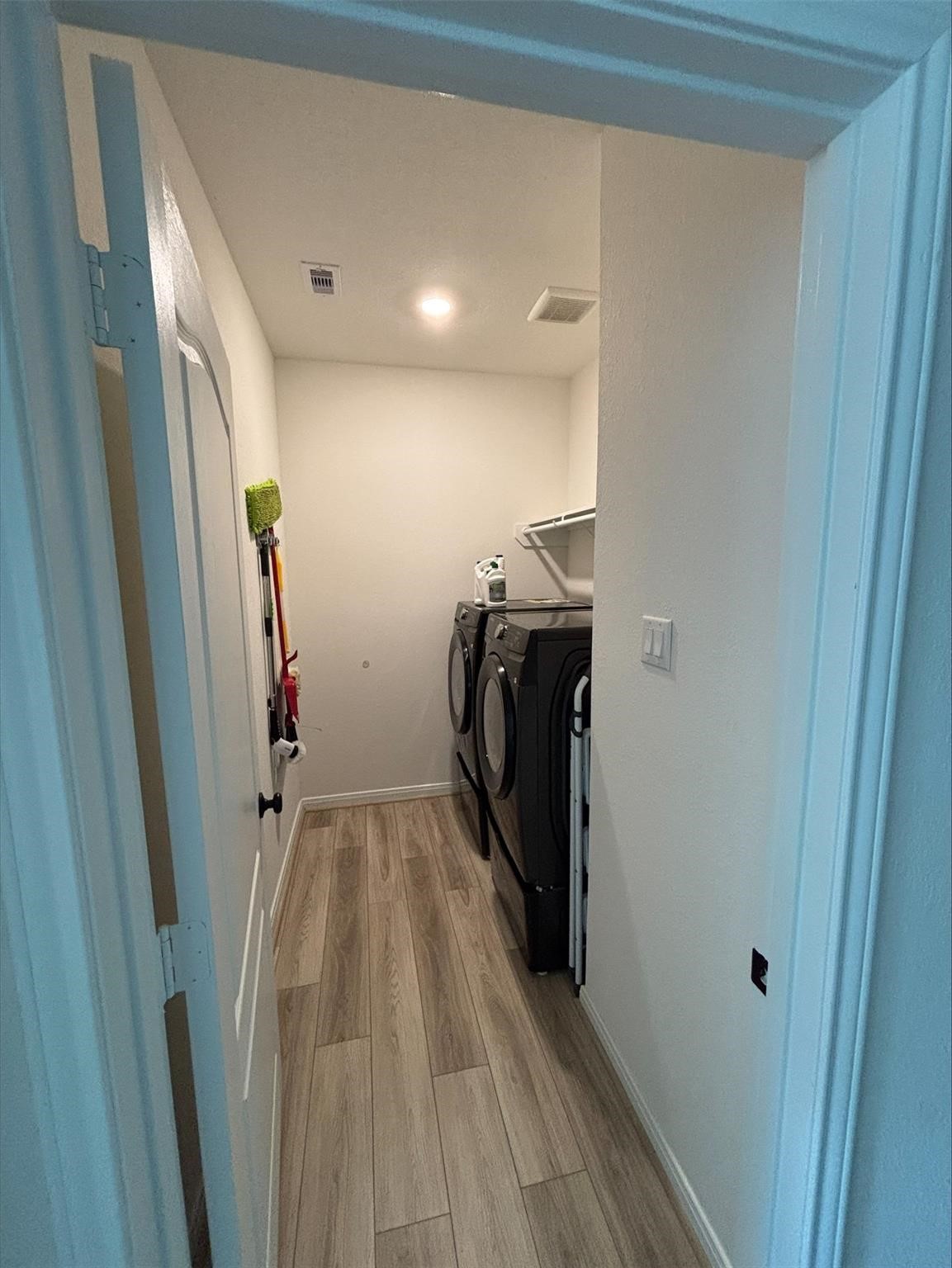 1323 Rosemead Drive Rosharon, TX 77583 - Photo 10 of 27 a view of walk in closet with clothes and shoes