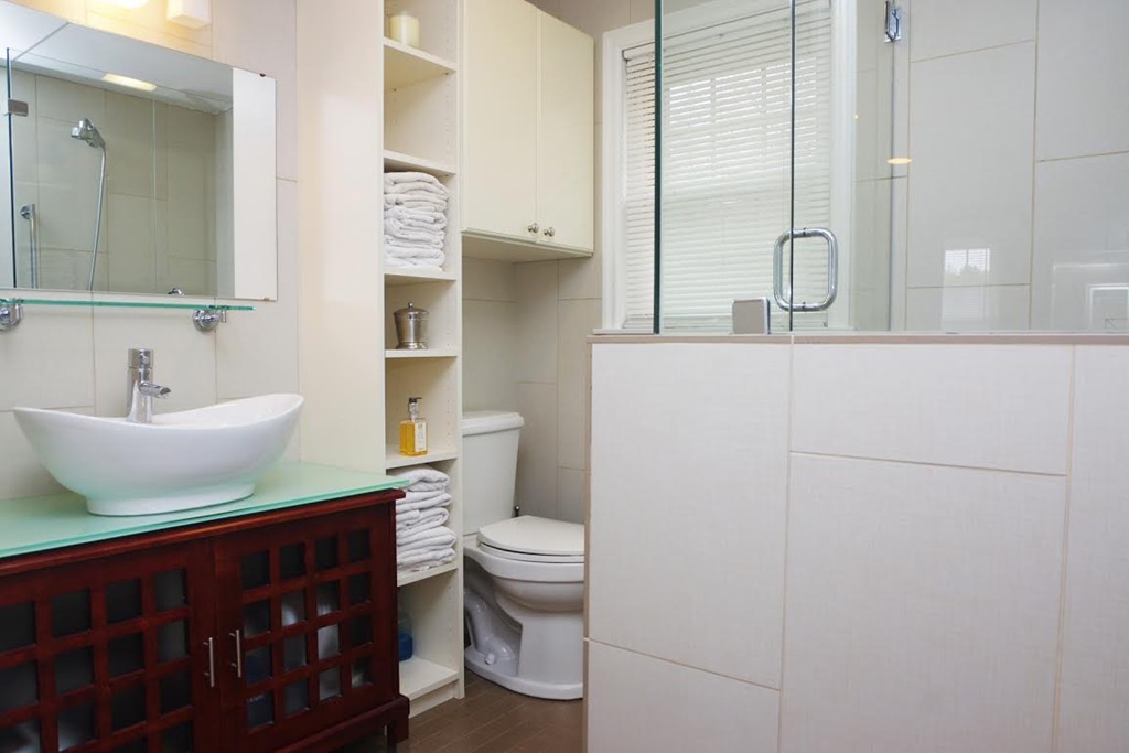 2 Ridge Road Haverhill, MA 01830 - Photo 8 of 23 a bathroom with a toilet a sink and mirror